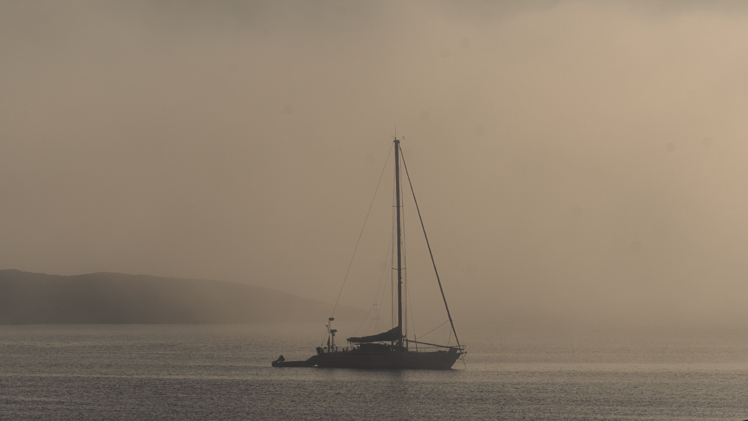 Boat in the fog — Sweden. Photograph by Karl Evans.