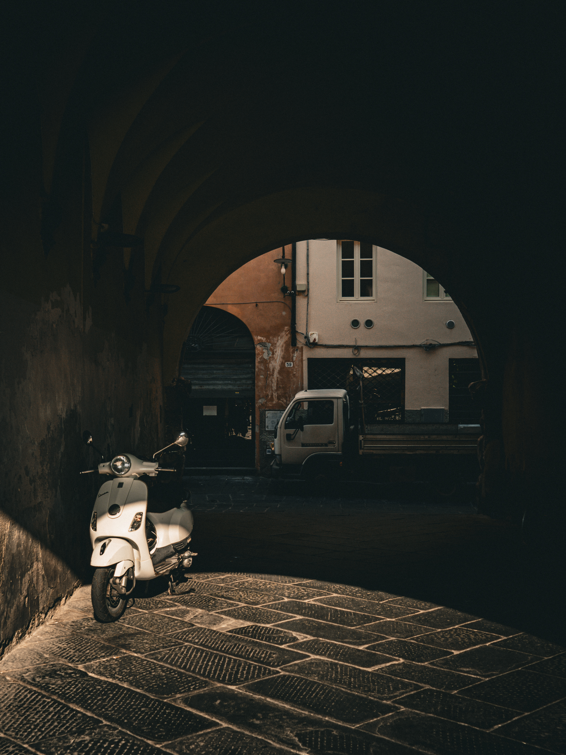 Moped in the sun, waiting to go